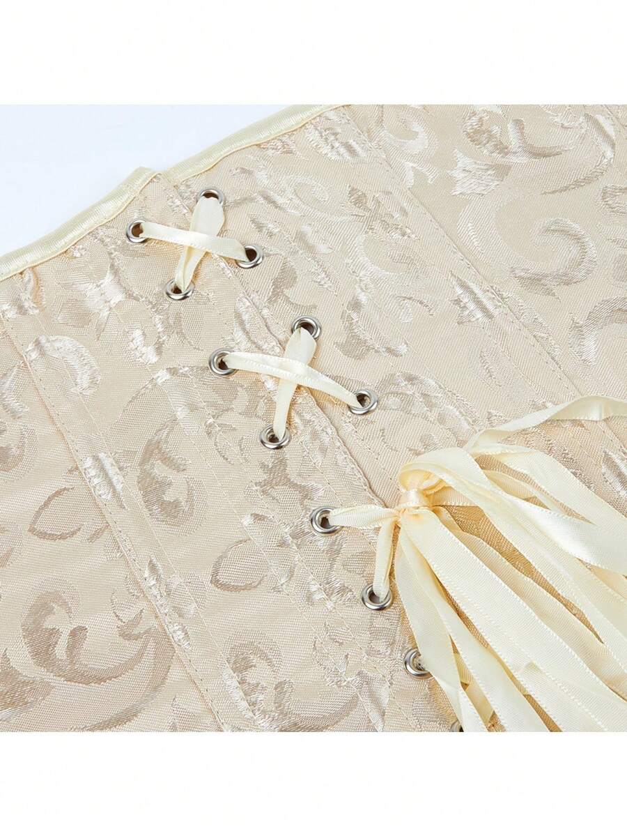 Vintage lace-up waist trainer corset with grommet eyelet details and plant pattern, designed for Halloween styling.