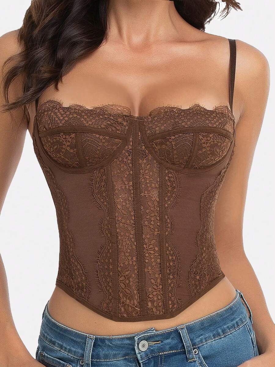 Black lace bustier corset top for women with asymmetrical contrast lace, lace-up detail, sleeveless crop cut, and light support.