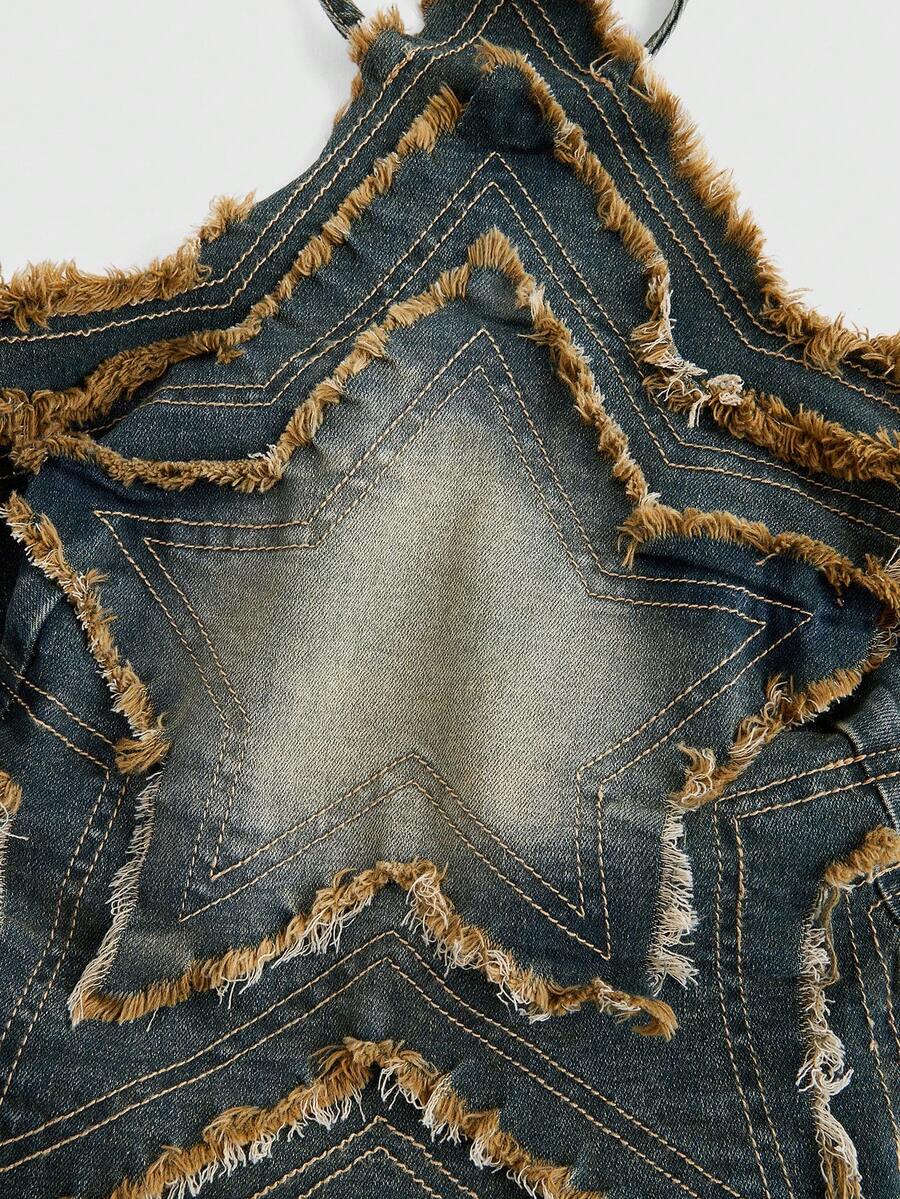 Blue denim halter tank top for women featuring distressed star patch detail, asymmetrical crop hem, and backless tie-back design.