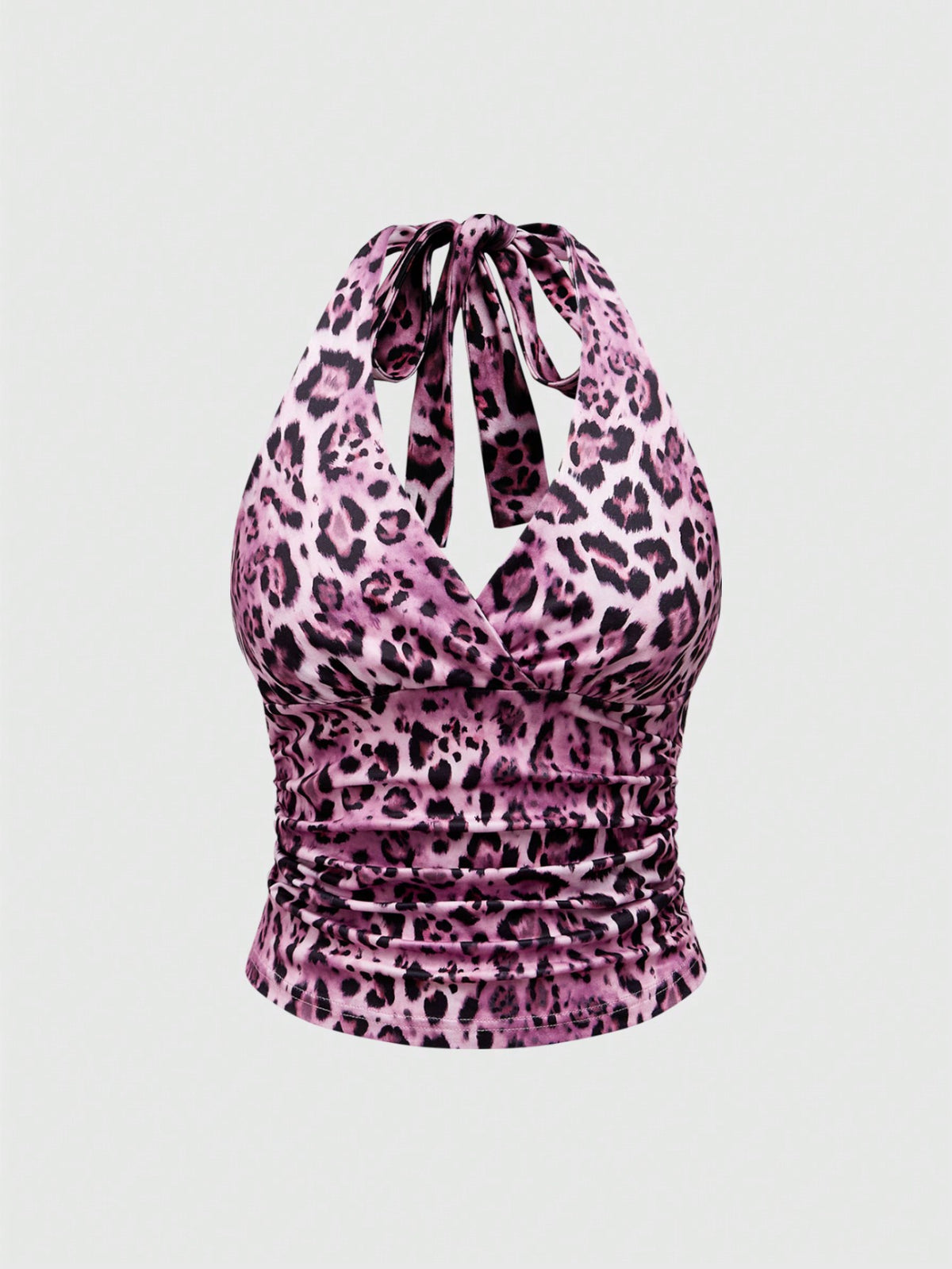 Women's halter crop tank top featuring a backless silhouette and ruched detailing in a slim fit design.