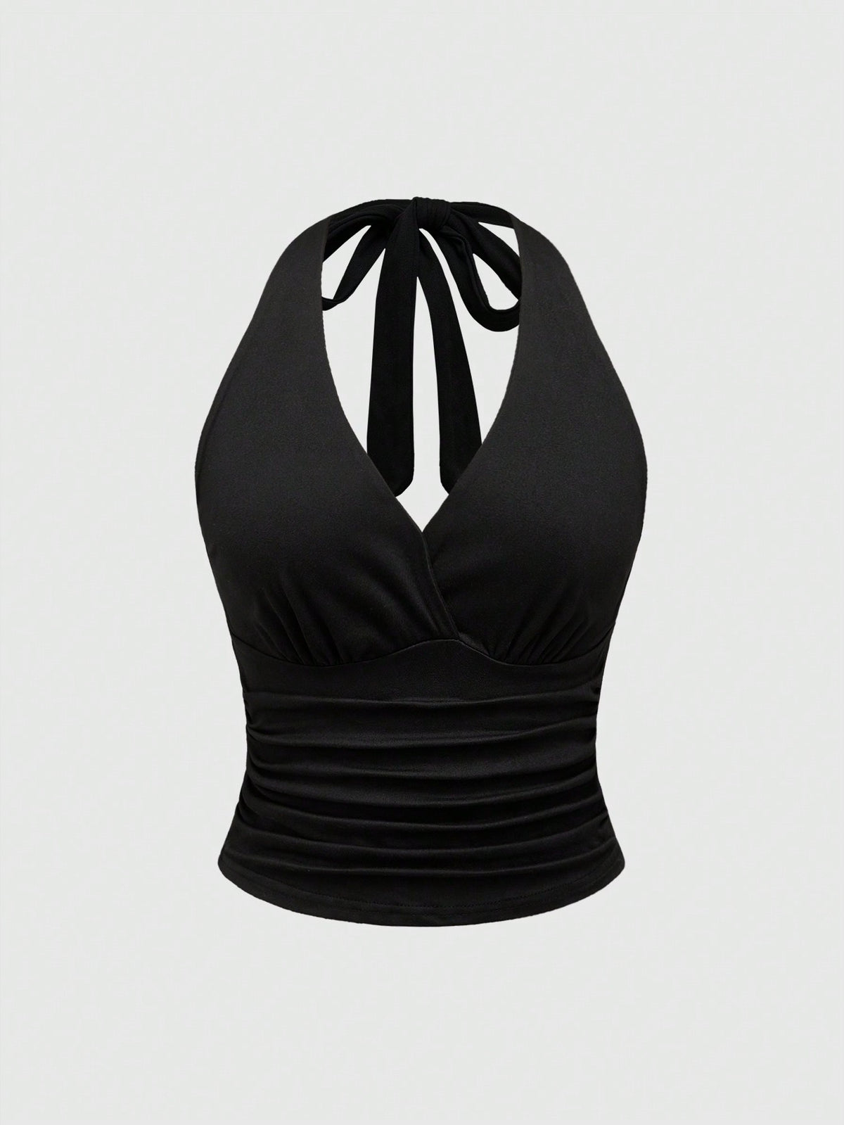 Women's halter crop tank top featuring a backless silhouette and ruched detailing in a slim fit design.