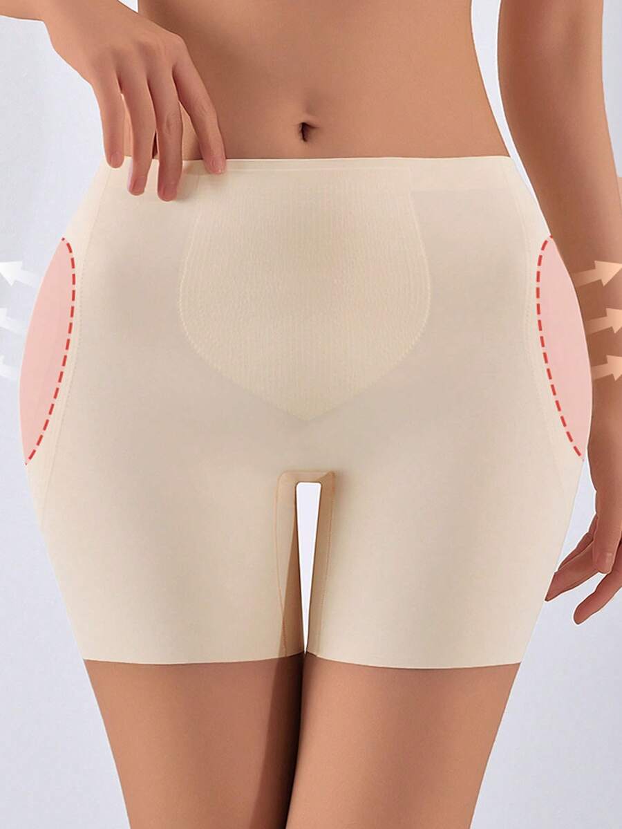 Women's apricot seamless padded shapewear panties featuring tummy control design and teardrop foam padding.