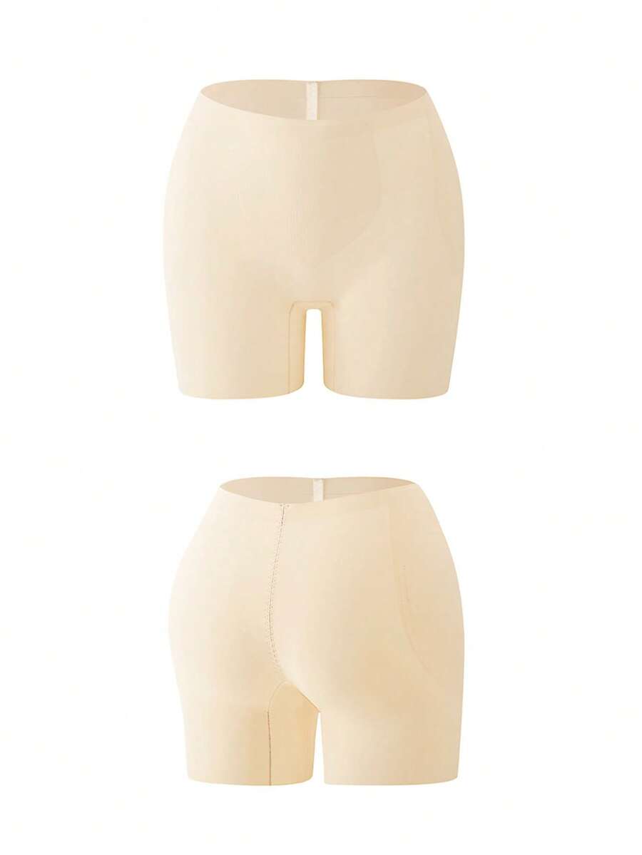 Women's apricot seamless padded shapewear panties featuring tummy control design and teardrop foam padding.
