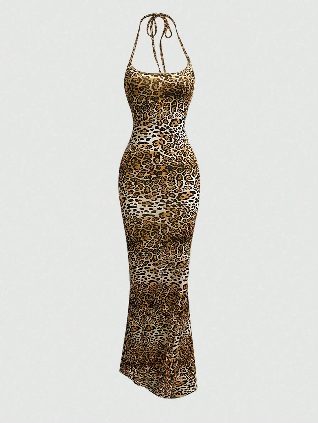 Women wearing a sleeveless leopard print halter neck maxi bodycon dress with a side slit