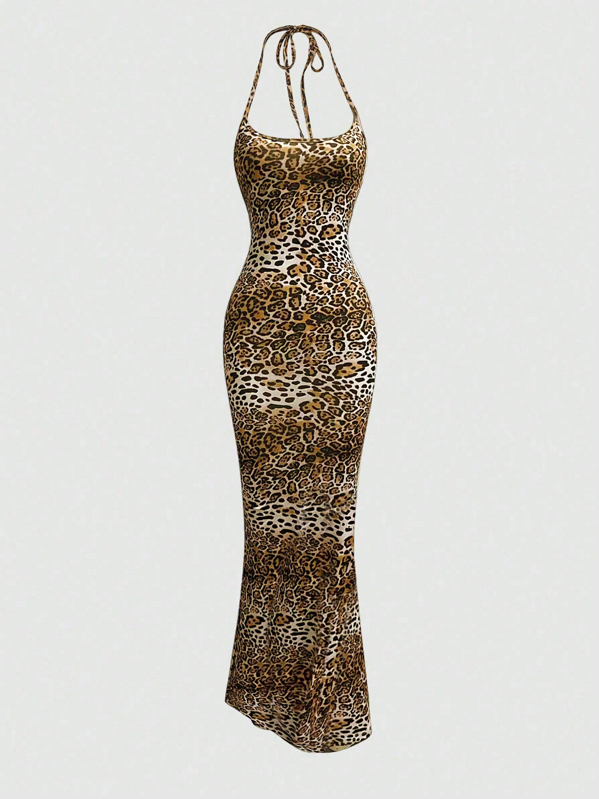 Women wearing a sleeveless leopard print halter neck maxi bodycon dress with a side slit
