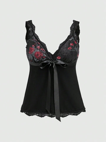 Women's black crop camisole top with rose pattern contrast lace, deep V-neck, and wide shoulder straps.