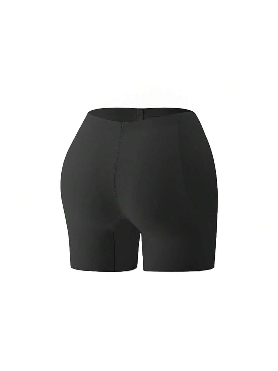 Women's apricot seamless padded shapewear panties featuring tummy control design and teardrop foam padding.