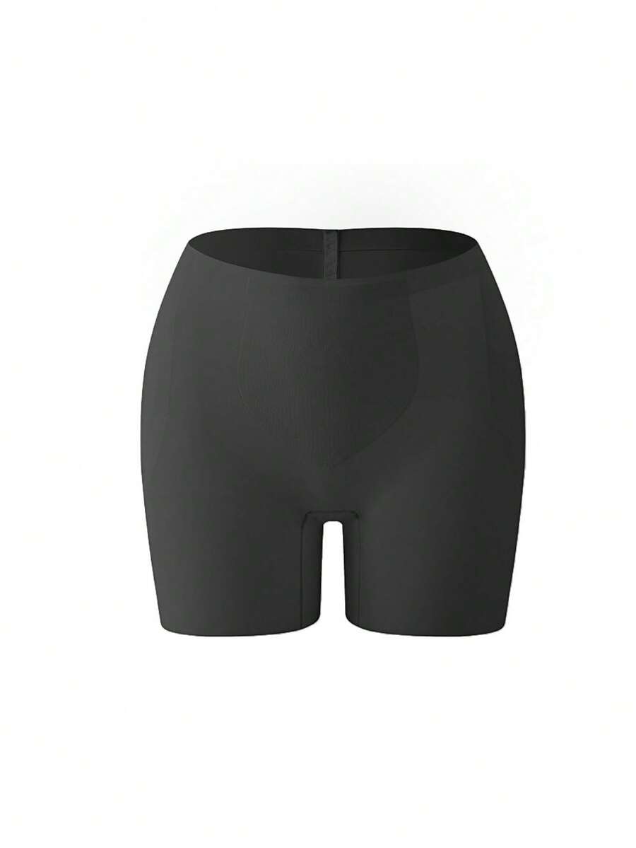 Women's apricot seamless padded shapewear panties featuring tummy control design and teardrop foam padding.