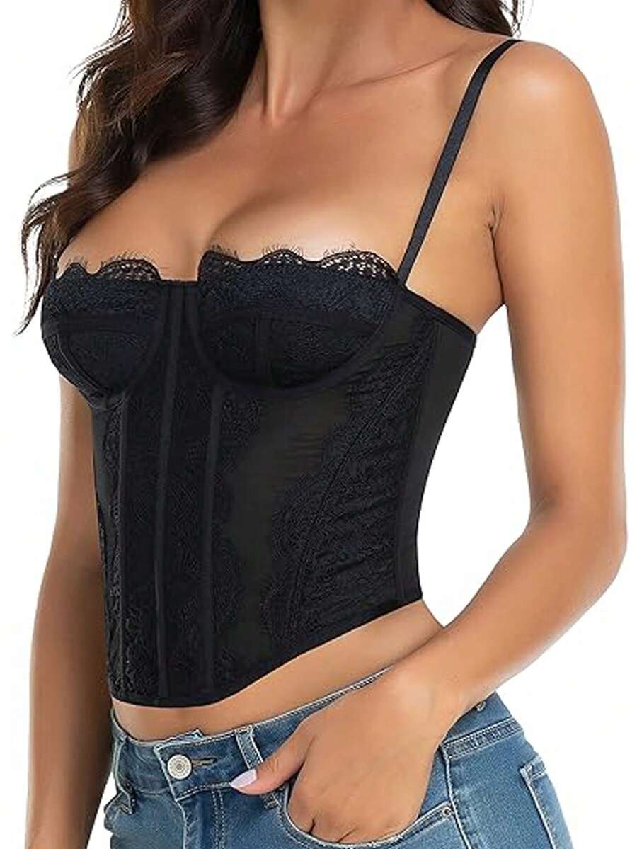 Black lace bustier corset top for women with asymmetrical contrast lace, lace-up detail, sleeveless crop cut, and light support.