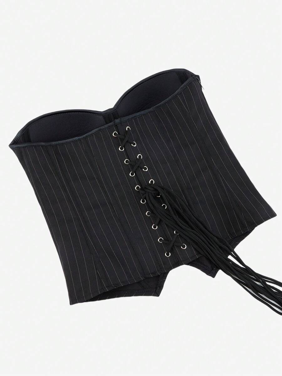 Black overbust corset top with strapless design, boned support, tie-back and zipper closure for women shapewear styling.