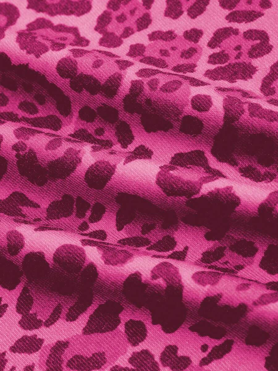 Women's pink leopard print cami tank top with contrast lace trim, small front bow, and spaghetti straps.