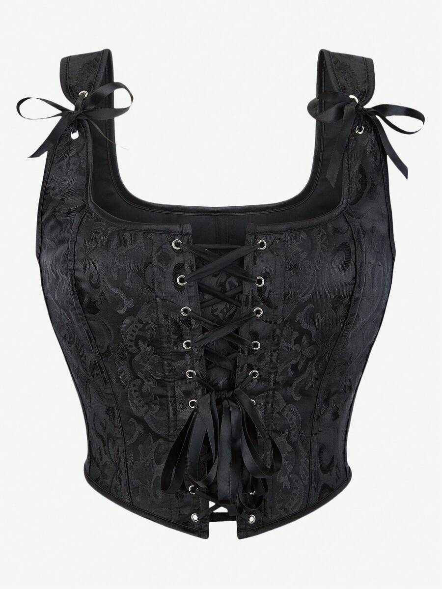 Women’s goth corset top in black with a lace-up back, sleeveless design, and structured bustier silhouette styled as outerwear.