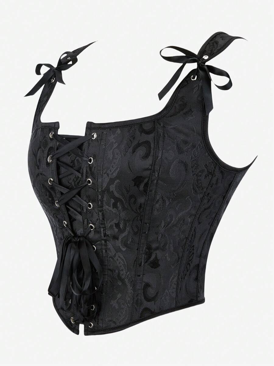 Women’s goth corset top in black with a lace-up back, sleeveless design, and structured bustier silhouette styled as outerwear.