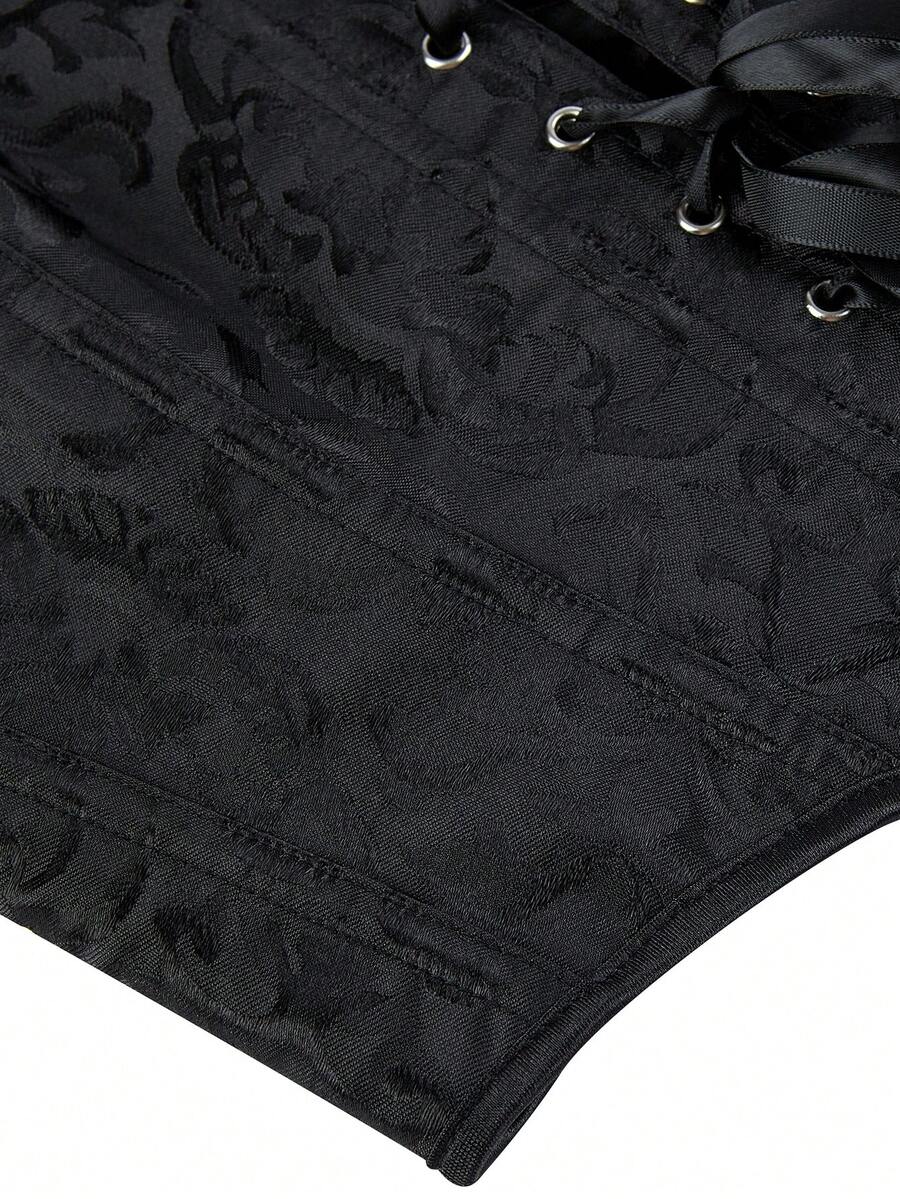 Women’s goth corset top in black with a lace-up back, sleeveless design, and structured bustier silhouette styled as outerwear.