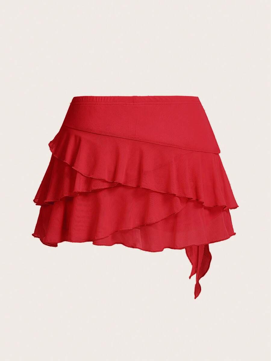 White tiered ruffle trim mini skirt for women with low waist, knot detail, mesh fabric, and casual Y2K boho design.