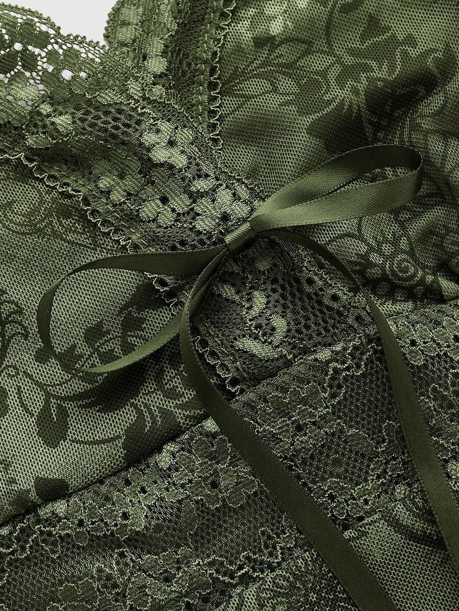 A women's sleeveless crop camisole featuring a vintage paisley print design with delicate lace trim along the neckline and thin spaghetti straps.