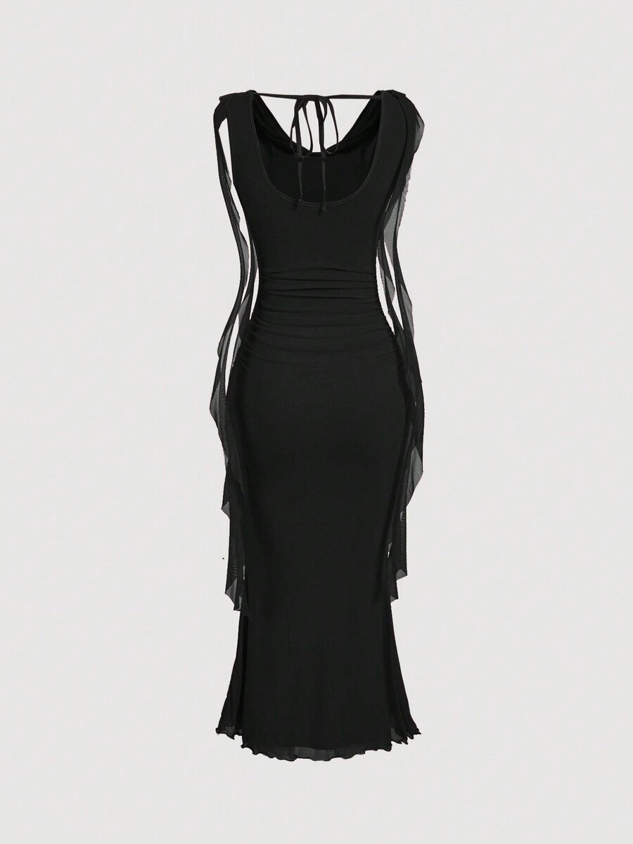 Sleeveless black cowl neck midi bodycon dress for women featuring a draped silhouette, split thigh detail, and slim fit knitted fabric.