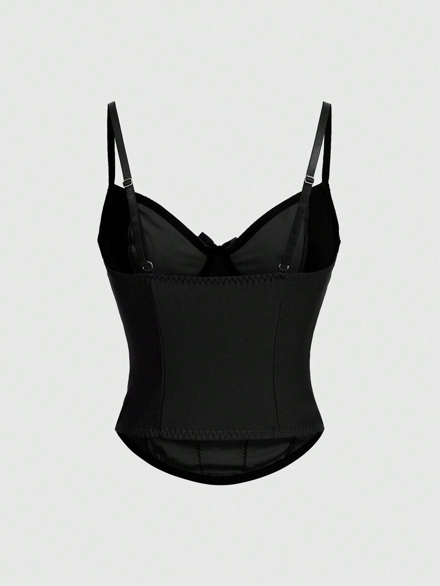 ROMWE women's black Goth Y2K contrast lace spaghetti strap cami crop top featuring bow details and waist tie decor.