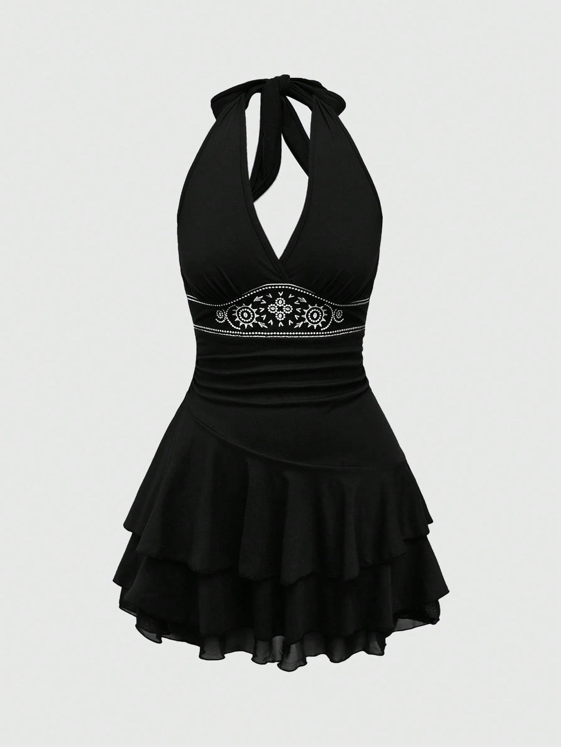 Women's sun totem embroidered sleeveless layered mini dress featuring a halter neck, backless tie back design, and slim fit high-waist A-line silhouette.