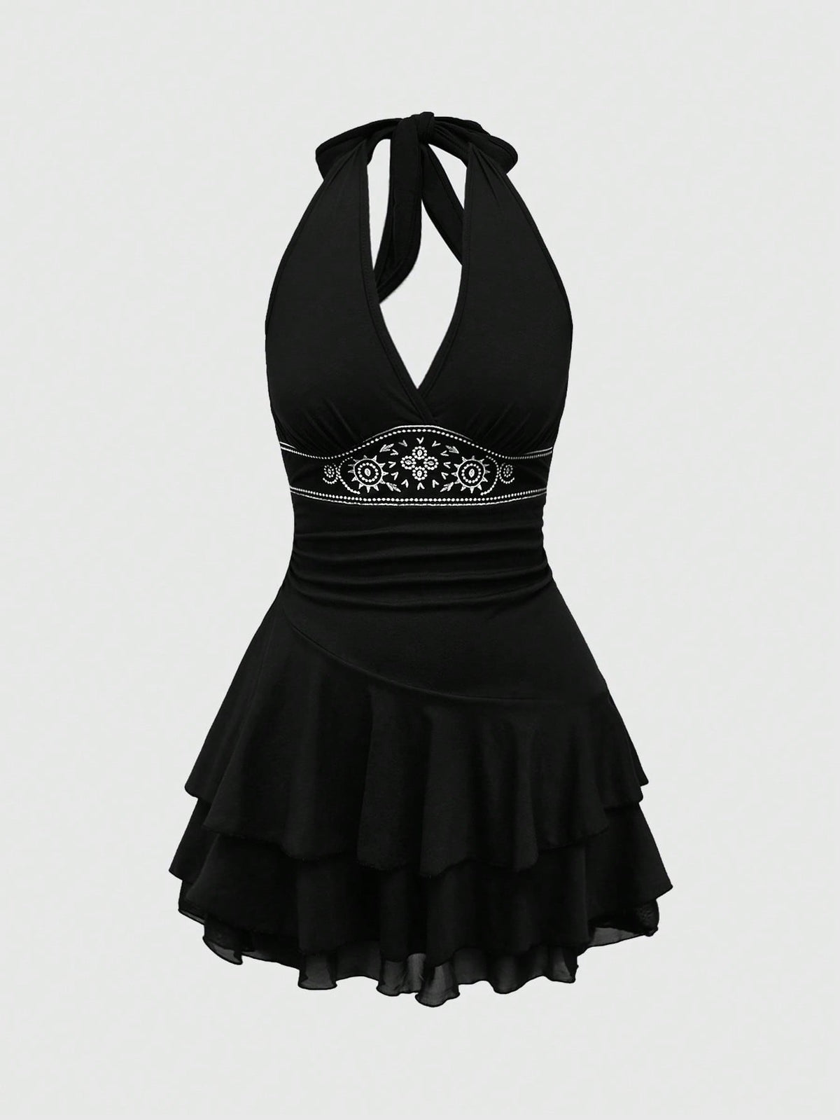 Women's sun totem embroidered sleeveless layered mini dress featuring a halter neck, backless tie back design, and slim fit high-waist A-line silhouette.