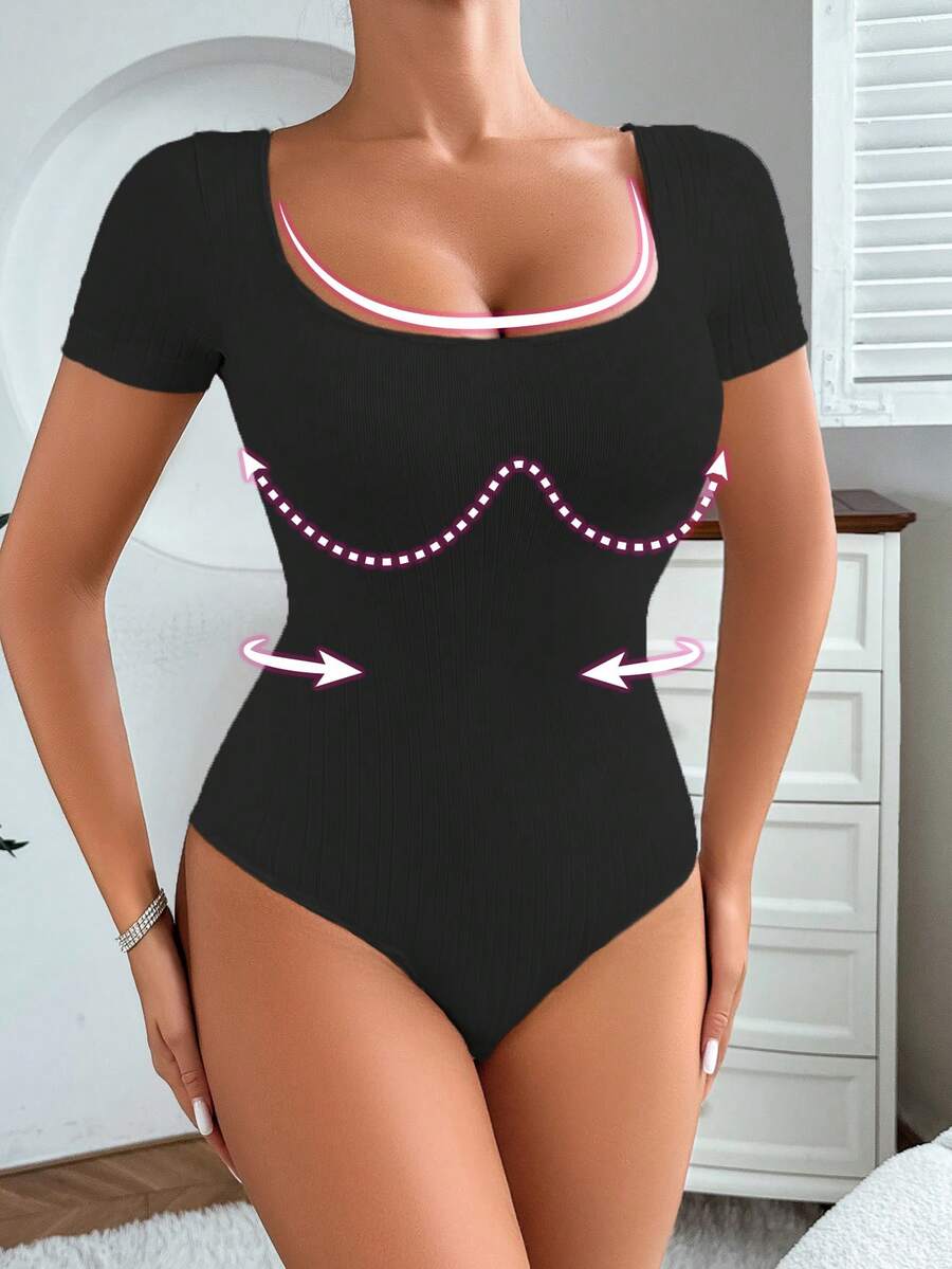 Women's seamless waist cincher bodysuit featuring short sleeves, briefs bottom, and rib-knit texture.