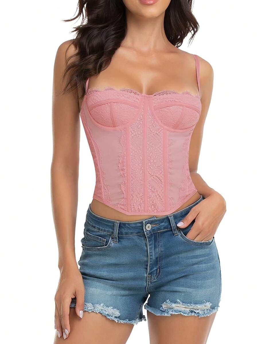 Black lace bustier corset top for women with asymmetrical contrast lace, lace-up detail, sleeveless crop cut, and light support.