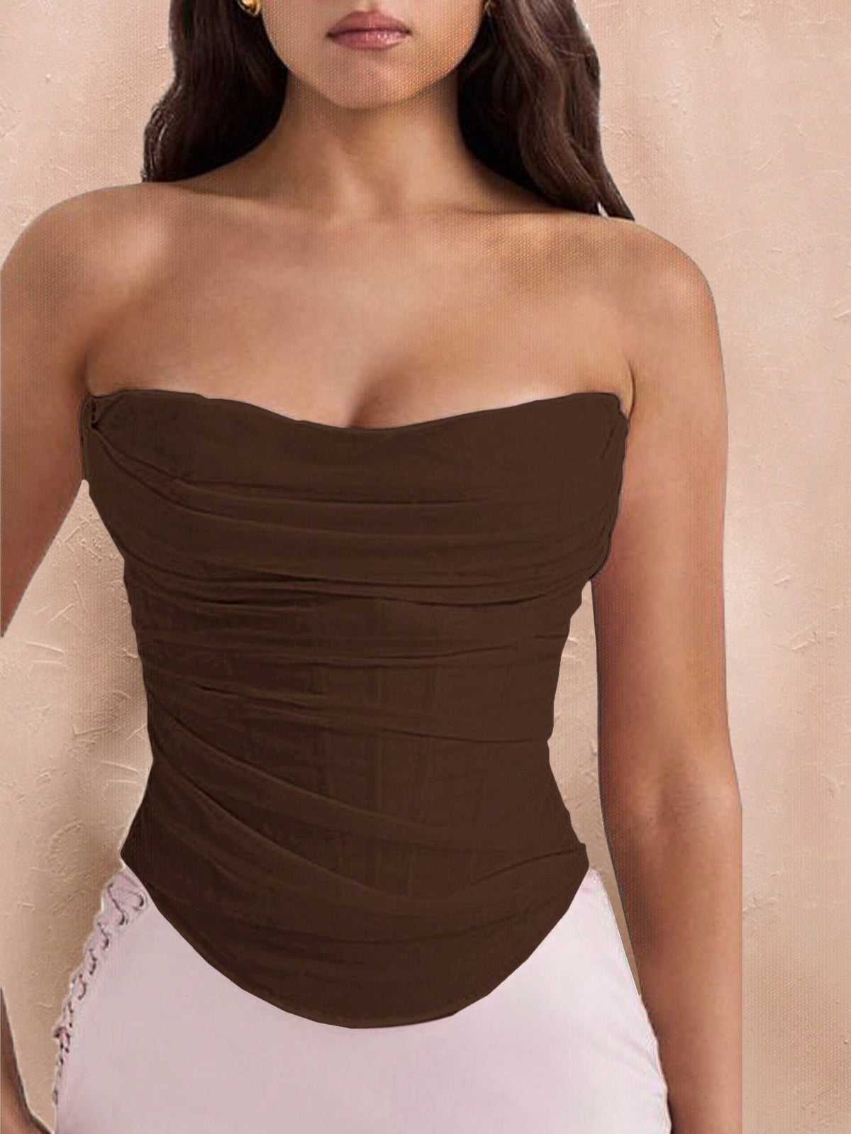 Black strapless corset crop top with asymmetrical lace-up ruched detailing and a slim fit for women.