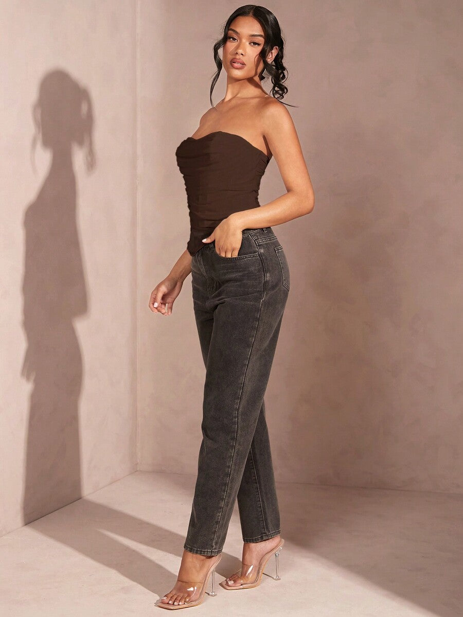 Black strapless corset crop top with asymmetrical lace-up ruched detailing and a slim fit for women.