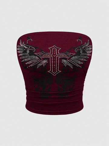 Women's strapless star print tube crop top featuring rhinestone details and ruched accents in burgundy knitted stretch fabric.
