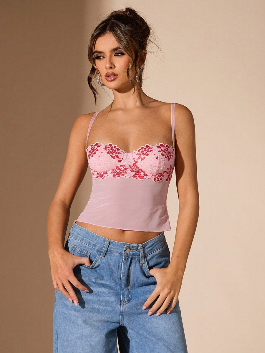 Women's black contrast lace camisole with spaghetti straps, cup detail, semi-sheer finish, and slim fit for going out or date night.