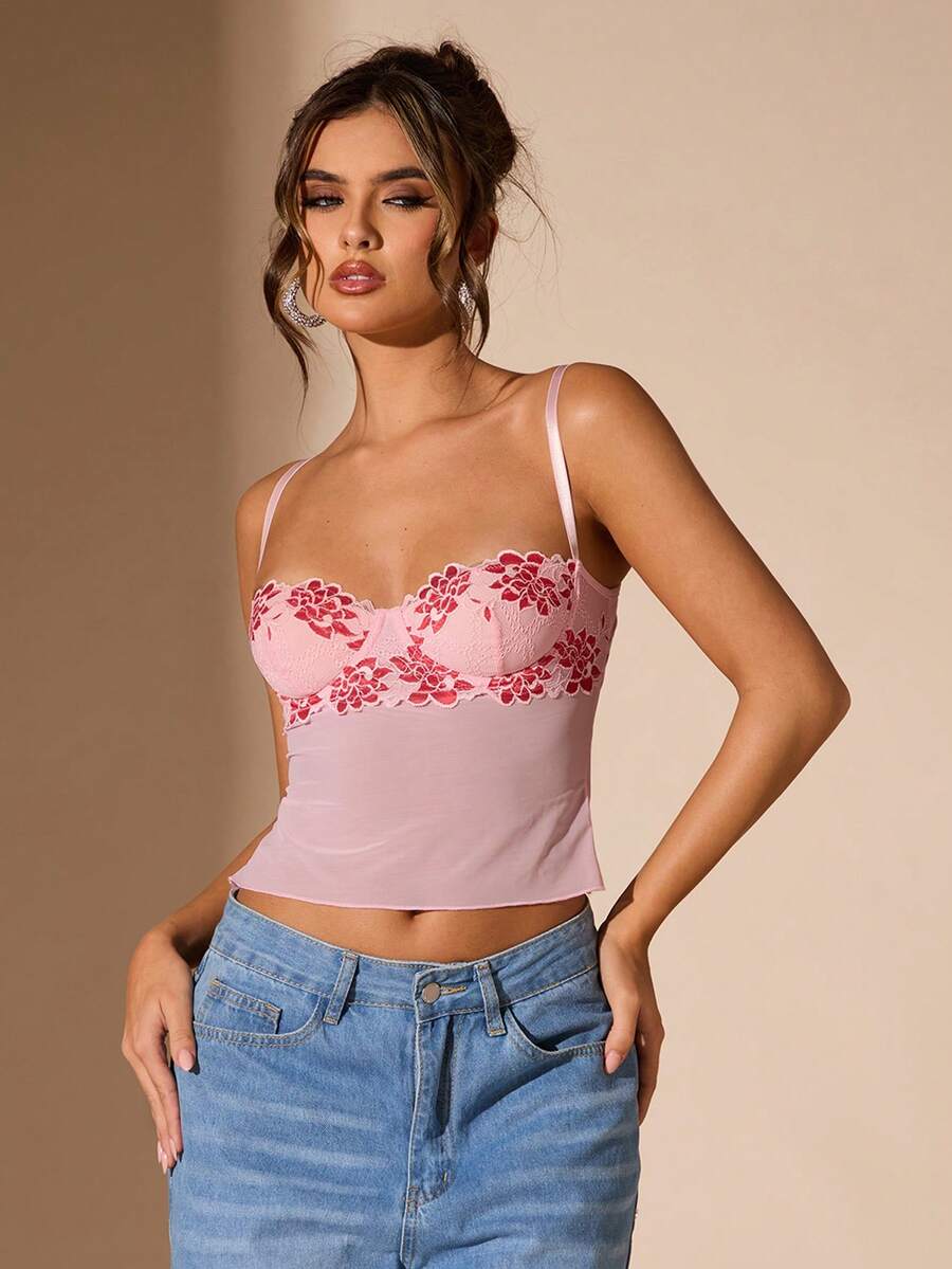 Women's black contrast lace camisole with spaghetti straps, cup detail, semi-sheer finish, and slim fit for going out or date night.