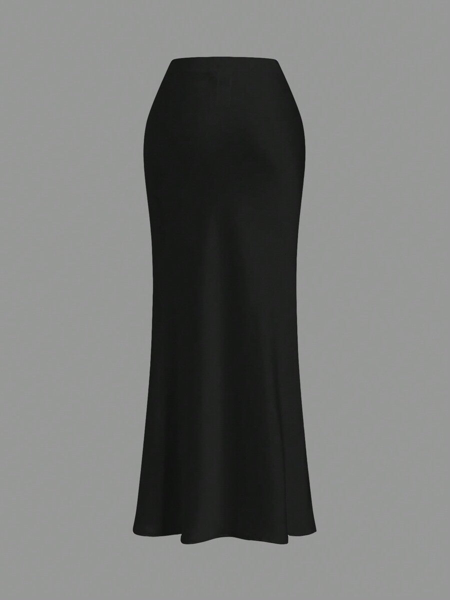 Women's black woven mermaid maxi skirt featuring a solid color design, mid waist, and 100% cotton fabric.