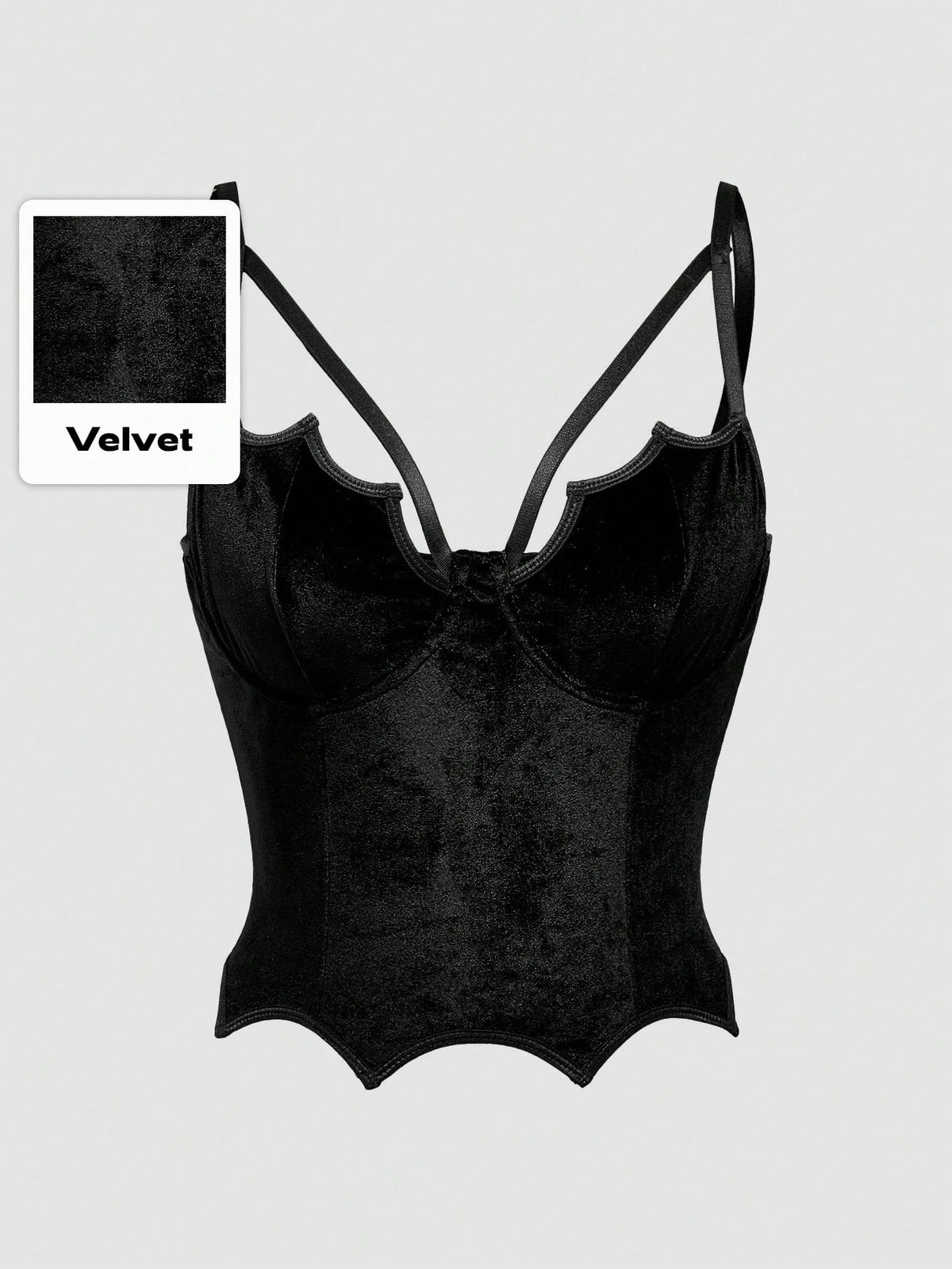 A women's black velvet crop camisole top featuring criss-cross shoulder straps, asymmetrical cut-out details, and a sleeveless vest neckline.