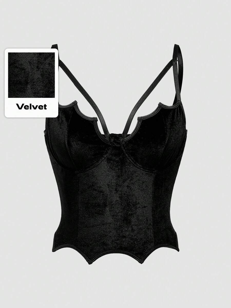 A women's black velvet crop camisole top featuring criss-cross shoulder straps, asymmetrical cut-out details, and a sleeveless vest neckline.