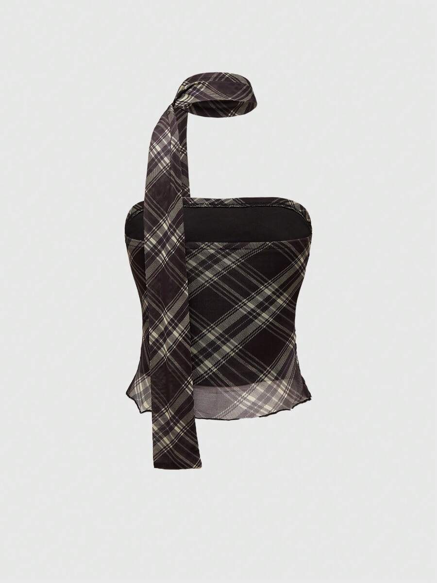 Women's black polka dot strapless tube top made of ruched mesh fabric featuring an asymmetrical hem and matching scarf.