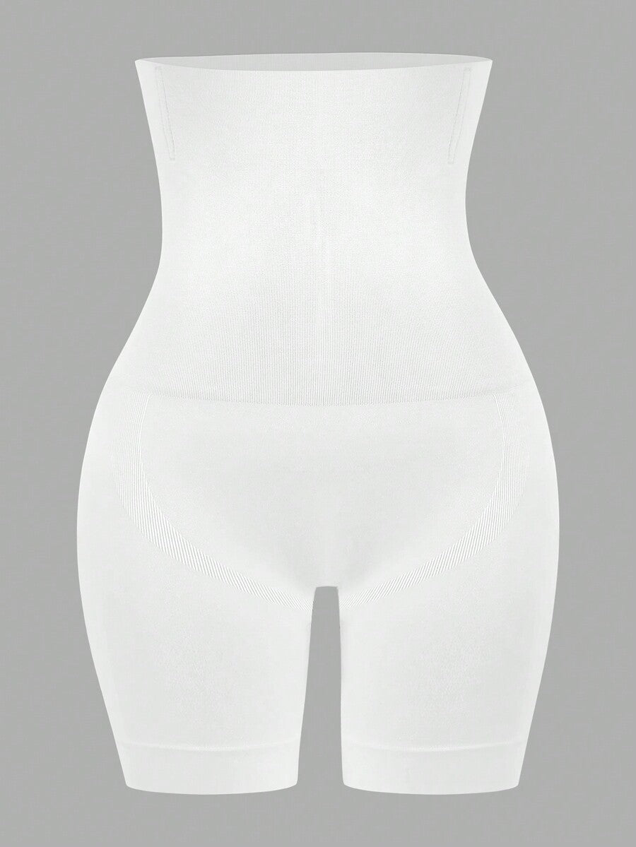 Apricot high stretch super high waist long shapewear shorts with textured pattern and semi-sheer fabric for women.