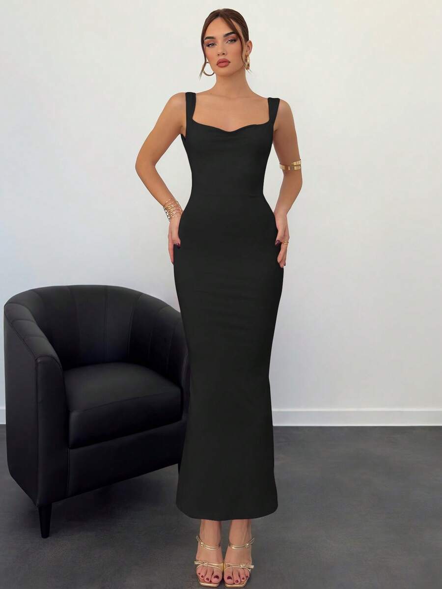 Beige sleeveless backless cami maxi dress for women featuring bow decor, split hem, and slim fit knitted fabric.