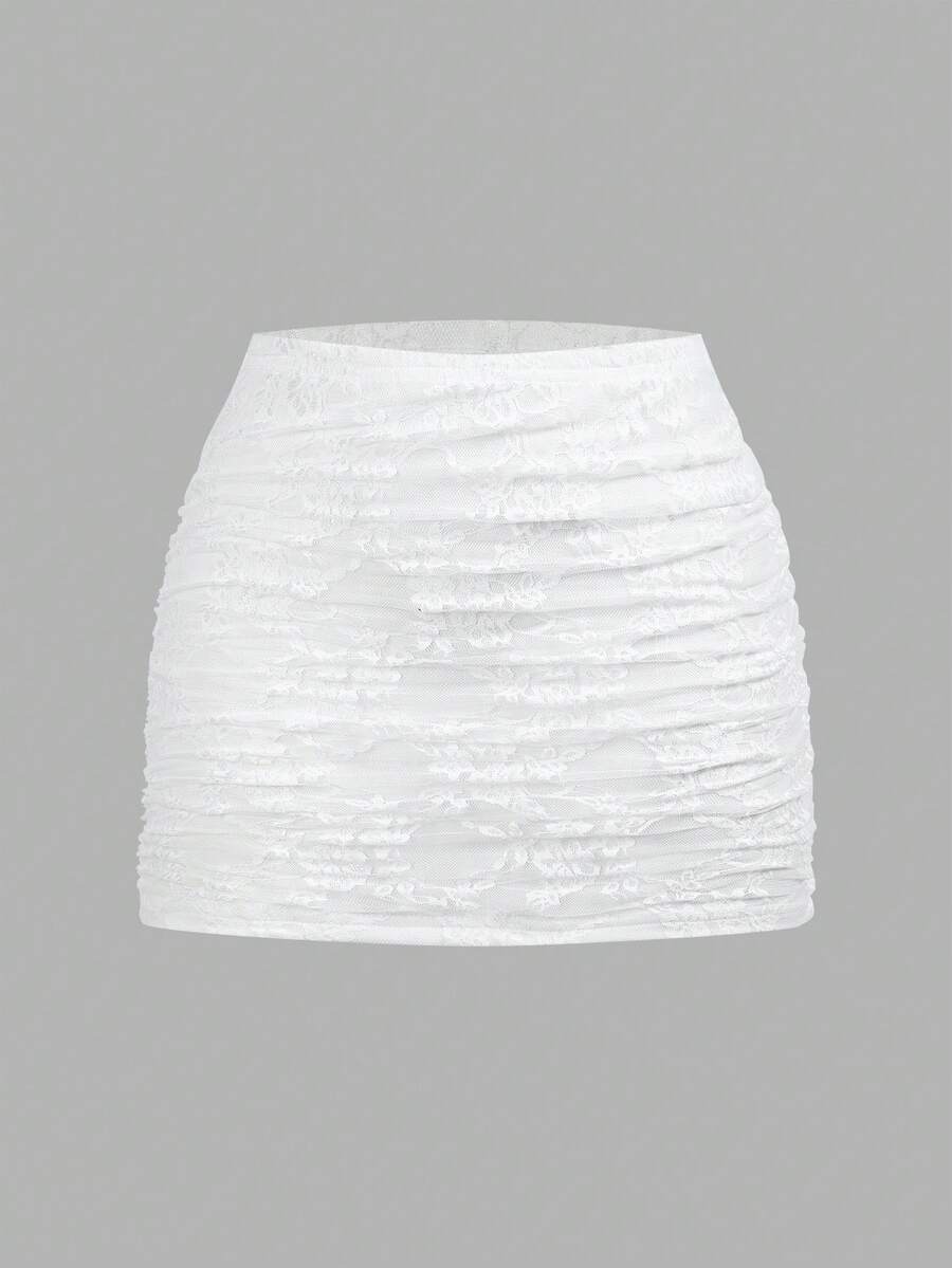 Women's black floral lace mini skirt featuring a ruched bodycon design, mid waist, and high stretch lined fabric.