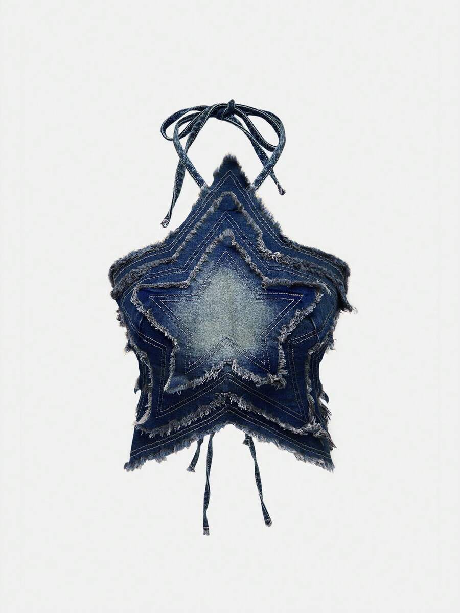 Blue denim halter tank top for women featuring distressed star patch detail, asymmetrical crop hem, and backless tie-back design.