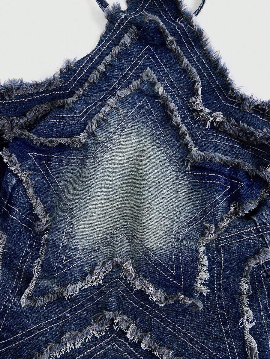 Blue denim halter tank top for women featuring distressed star patch detail, asymmetrical crop hem, and backless tie-back design.