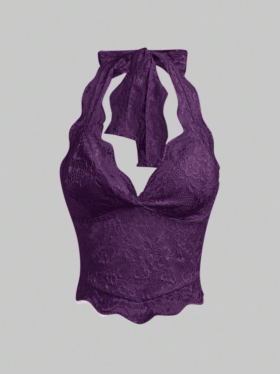 Women's black lace halter neck camisole featuring a backless crop silhouette, contrast lace trim, and scallop hem.