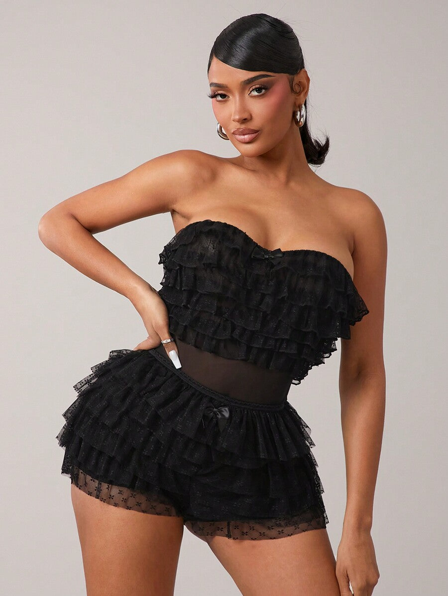 Apricot tiered lace ruffle hem low waist shorts for women featuring elastic waist and lined semi-sheer knit fabric.