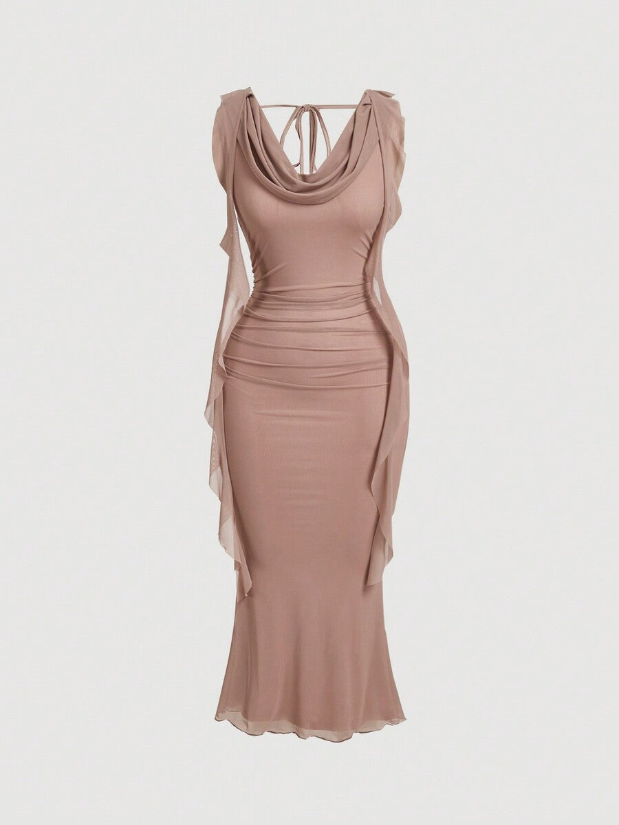 Sleeveless black cowl neck midi bodycon dress for women featuring a draped silhouette, split thigh detail, and slim fit knitted fabric.