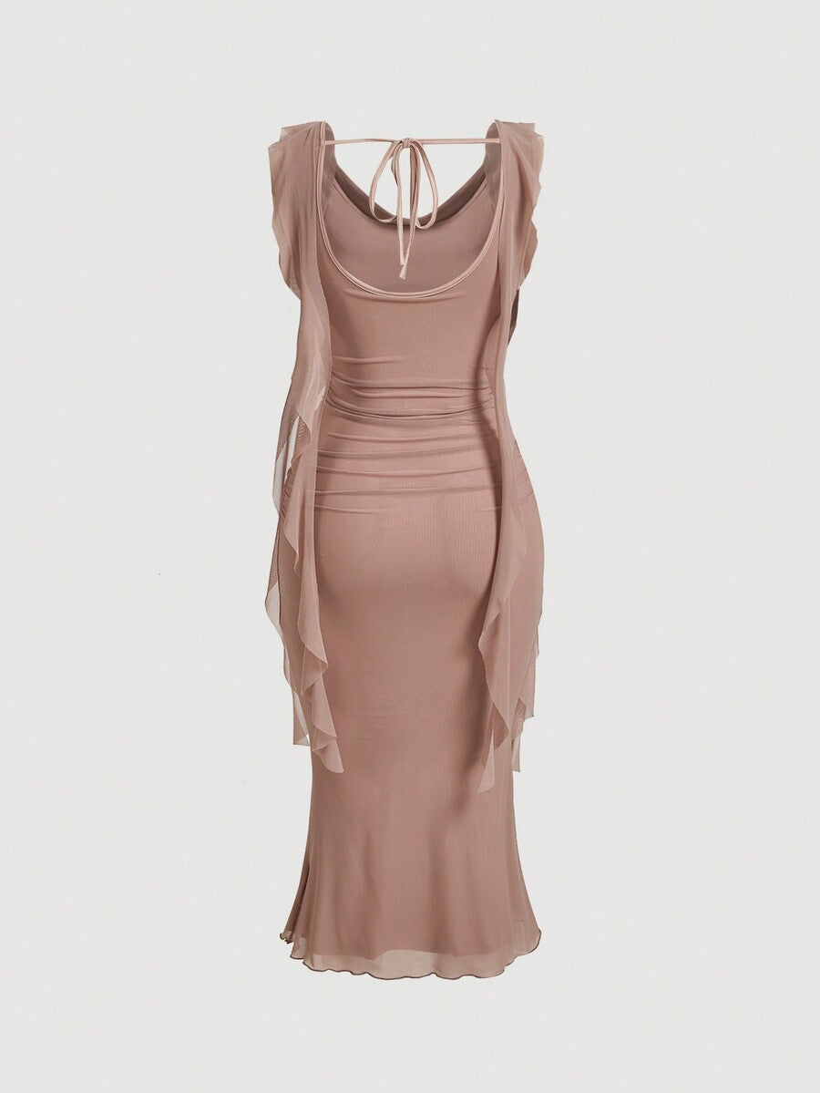 Sleeveless black cowl neck midi bodycon dress for women featuring a draped silhouette, split thigh detail, and slim fit knitted fabric.