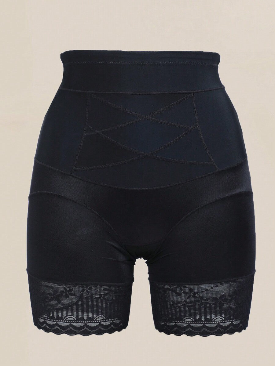 Black seamless high waist shapewear panty for women featuring tummy control, waist slimming design, and delicate contrast lace trim.