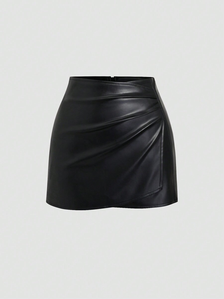 Women's black PU leather mini skort featuring a ruched asymmetrical wrap design with zipper closure.