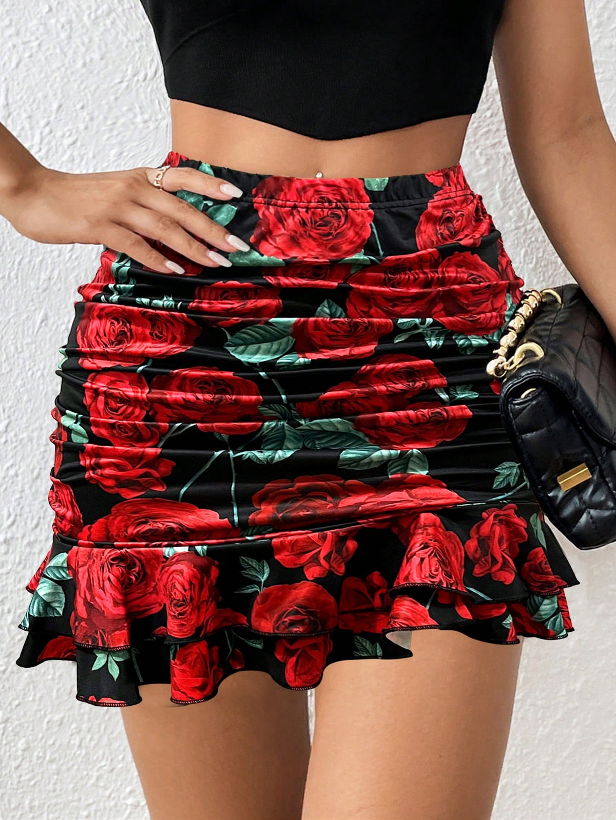 Black high waist ruched bodycon mini skirt featuring a tiered ruffle hem and skinny casual fit for women.