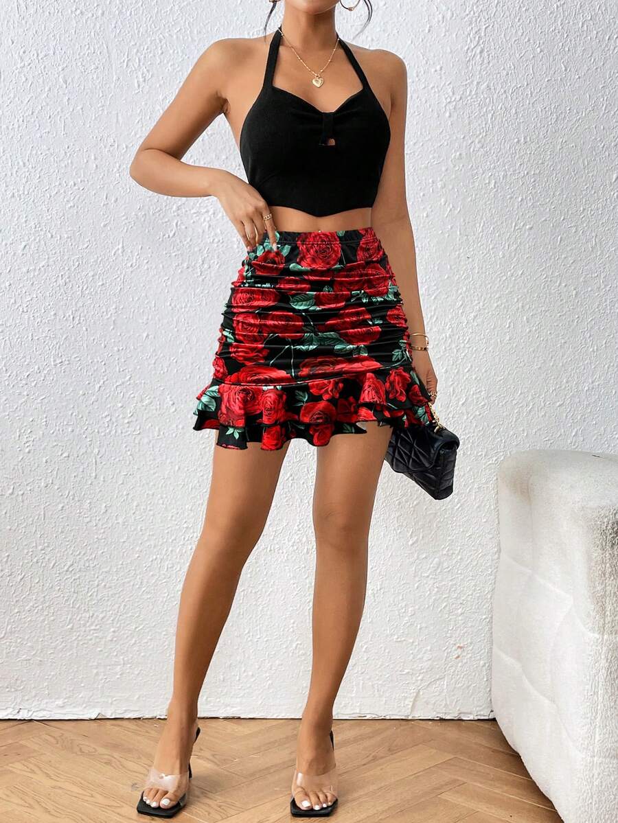 Black high waist ruched bodycon mini skirt featuring a tiered ruffle hem and skinny casual fit for women.