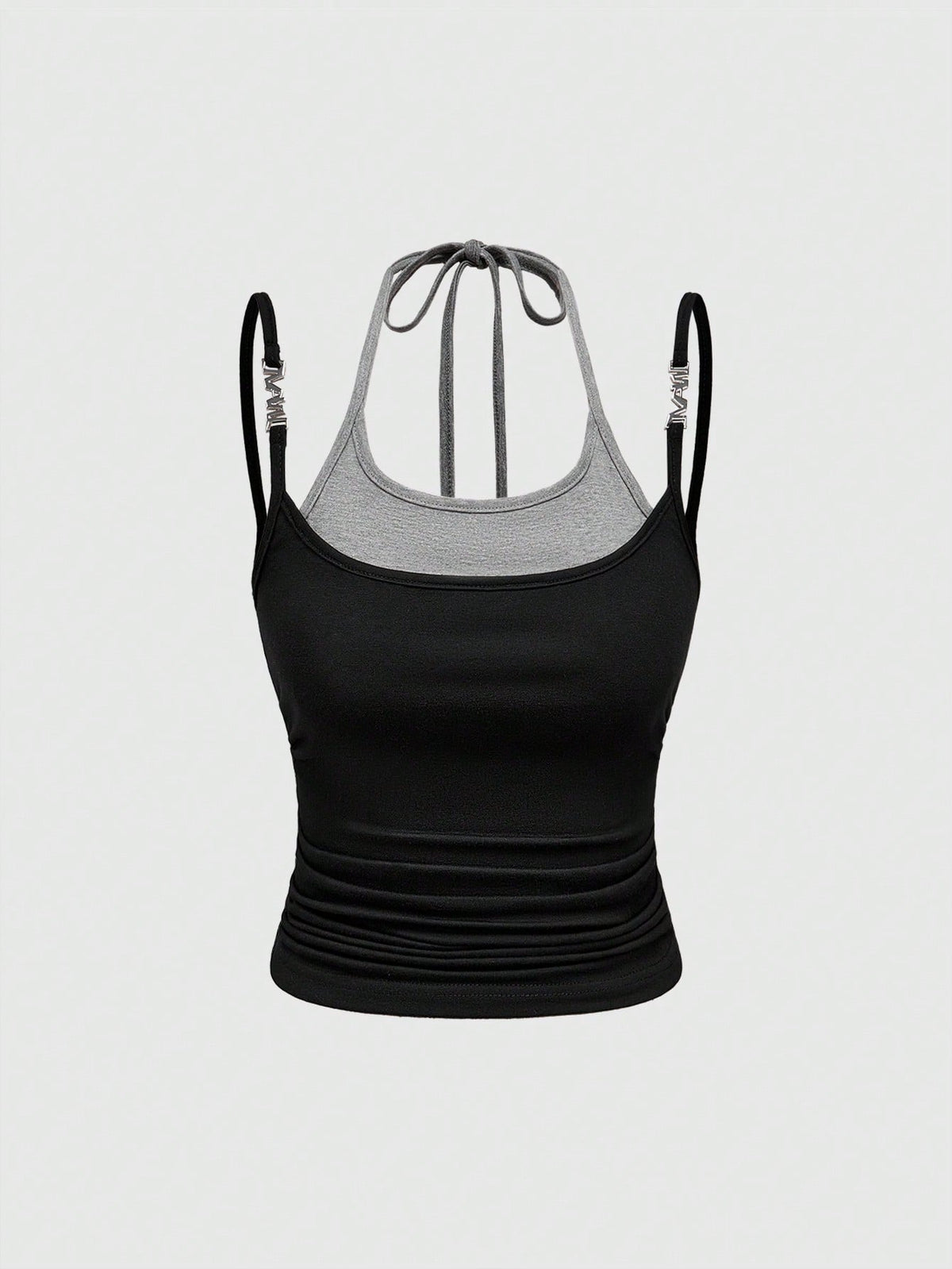 Black halter crop tank top featuring lace-up front details, ruched texture, eye appliques, and matching detached arm sleeves.