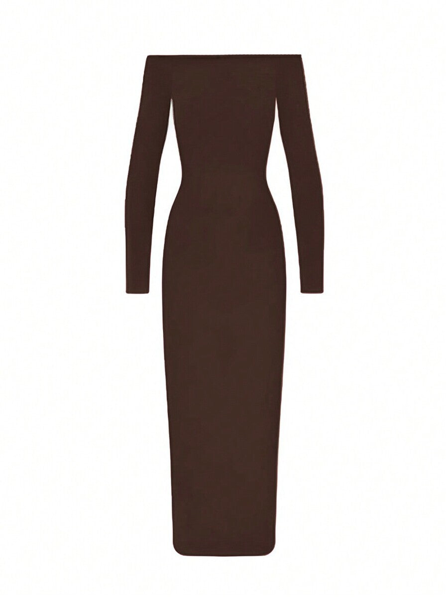 Woman wearing an elegant off-the-shoulder bodycon long dress with backless design and pencil silhouette in high-stretch knitted fabric.